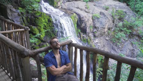 Young-man-relaxing-in-nature-happily-and-without-stress.